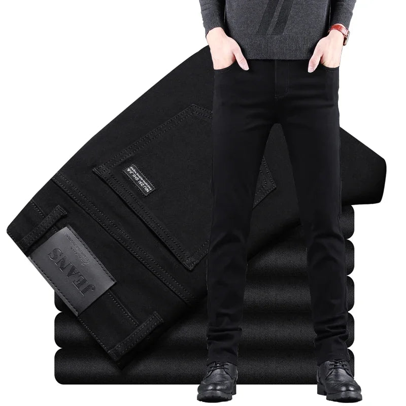Men’s black skinny fit jeans worn by mode